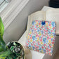 The Daily Chapter Blue and Yellow Floral Book/E-Reader Sleeve – Handmade, Protective & Stylish