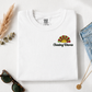 Chasing Waves Embroidered Unisex T-Shirt | Retro Sunburst Beach Tee